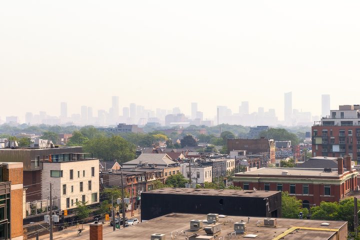 City skyline hazy with smoke from wildfires.